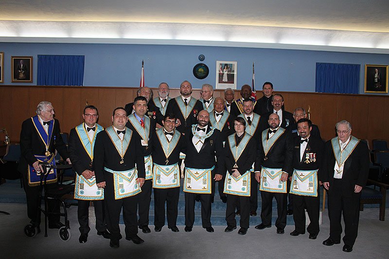 Members gathered in the Lodge room for an installation